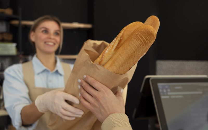 medium-shot-woman-working-bakery (2)